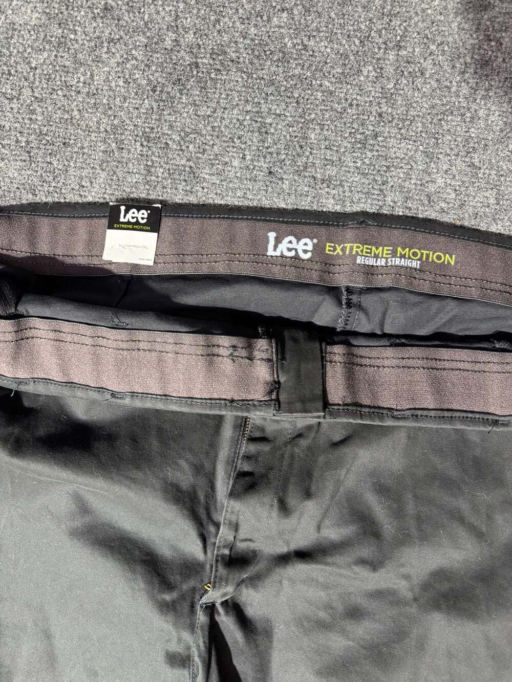 Lee Men's Big & Tall Extreme Motion Flat Front Regular Straight Pant Black 52W X